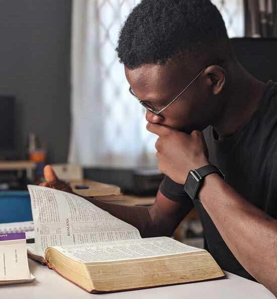 Man studying Bible as Adventists believe reading & studying the Bible is key to growing relationship with God