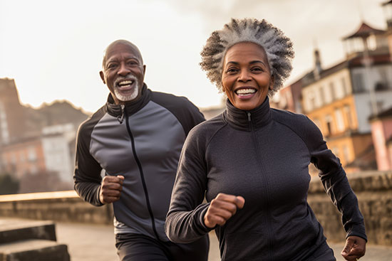 An elderly Adventist couple jogging together to stay healthy