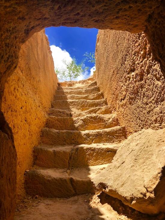 An empty tomb, symbolizing Jesus' resurrection on Sunday after resting in the tomb on Sabbath