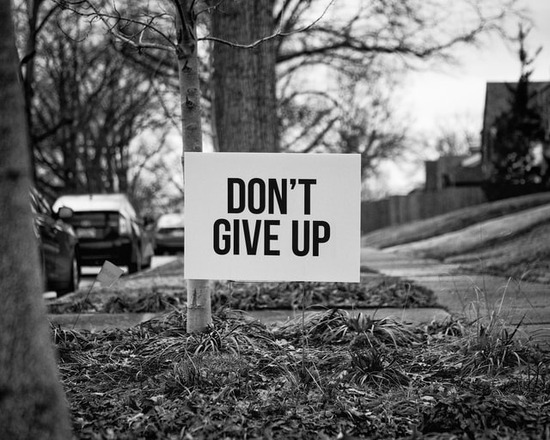 A don't give up words of hope showing the opposite of worry