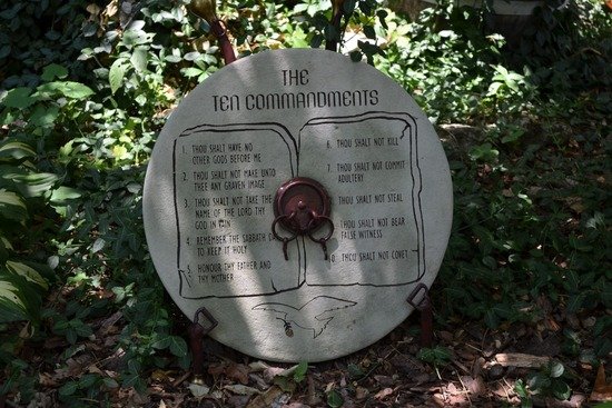 A stone disk engraved with the Ten Commandments.
