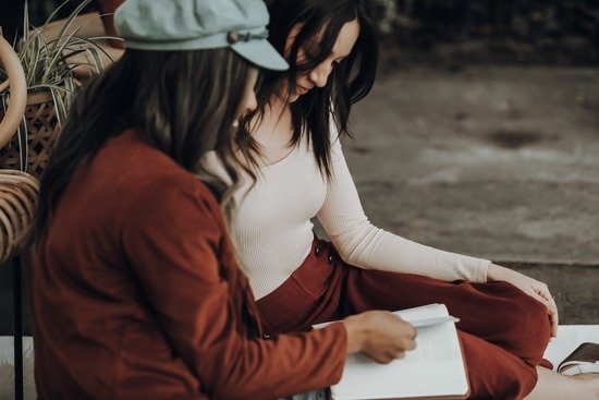 Two women having a discussion about the Bible and what Adventists believe